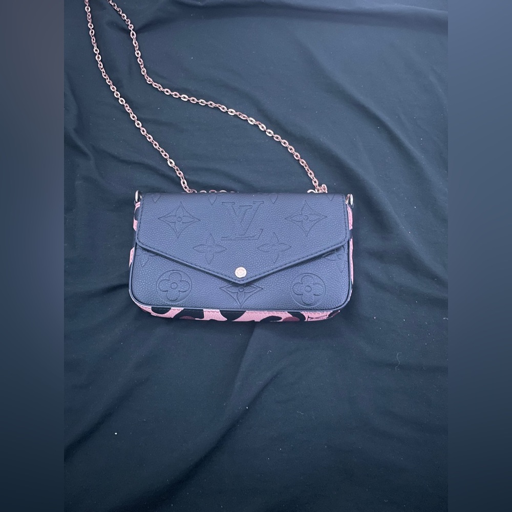 Louis Vuitton pink camouflage purse and wallet